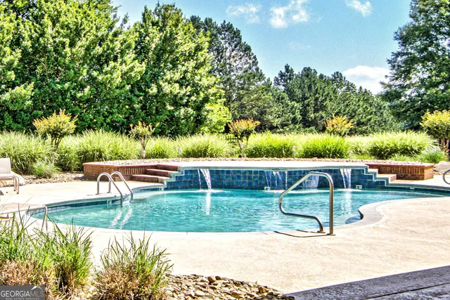 a view of lake with a big yard