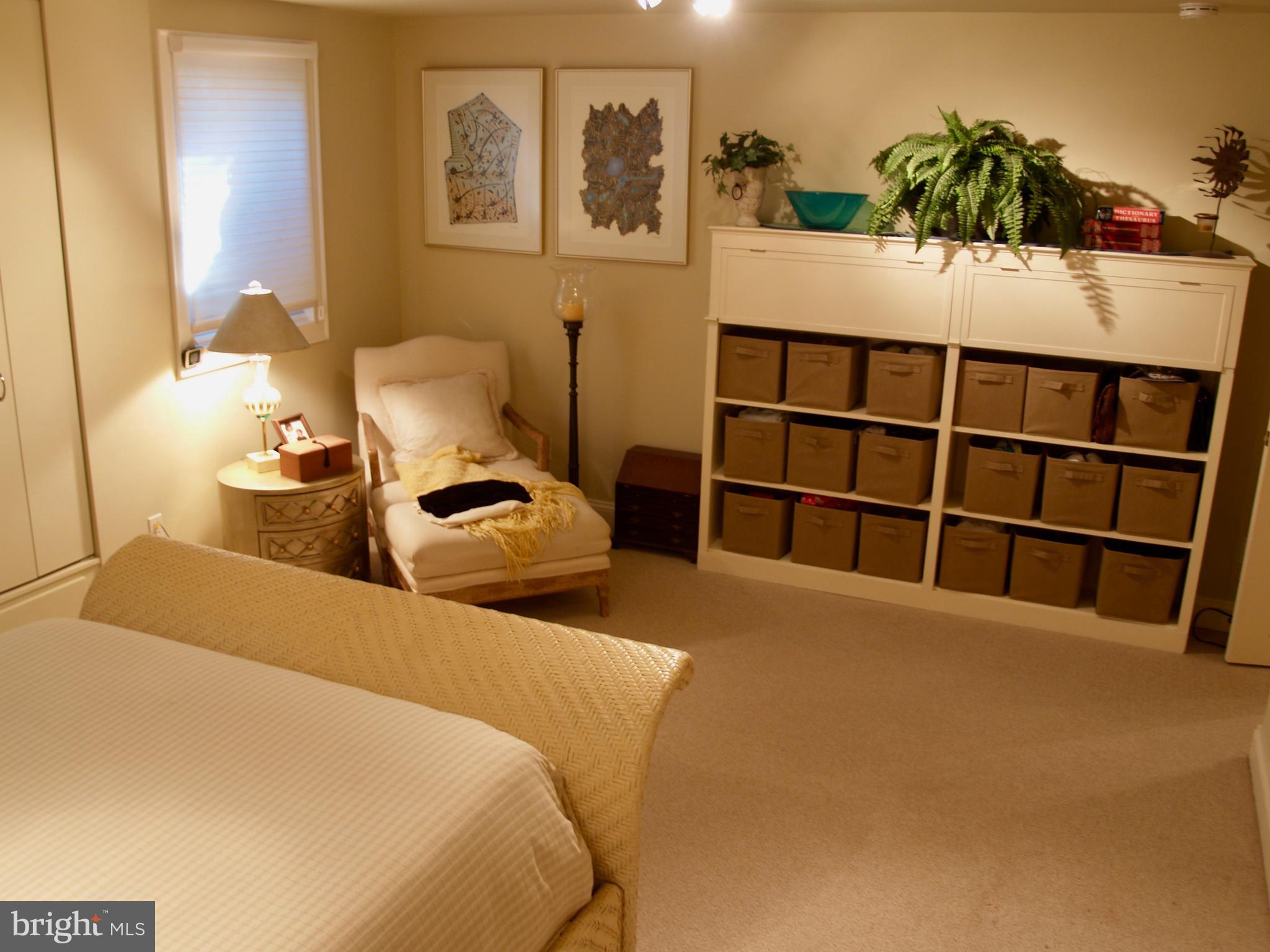 6306 Valley Road Bethesda, MD 20817 - Photo 57 of 74 a bedroom with a bed and a cabinets