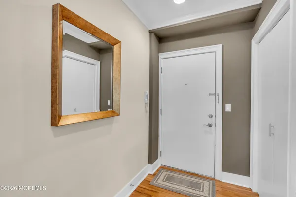 a view of a hallway with entryway