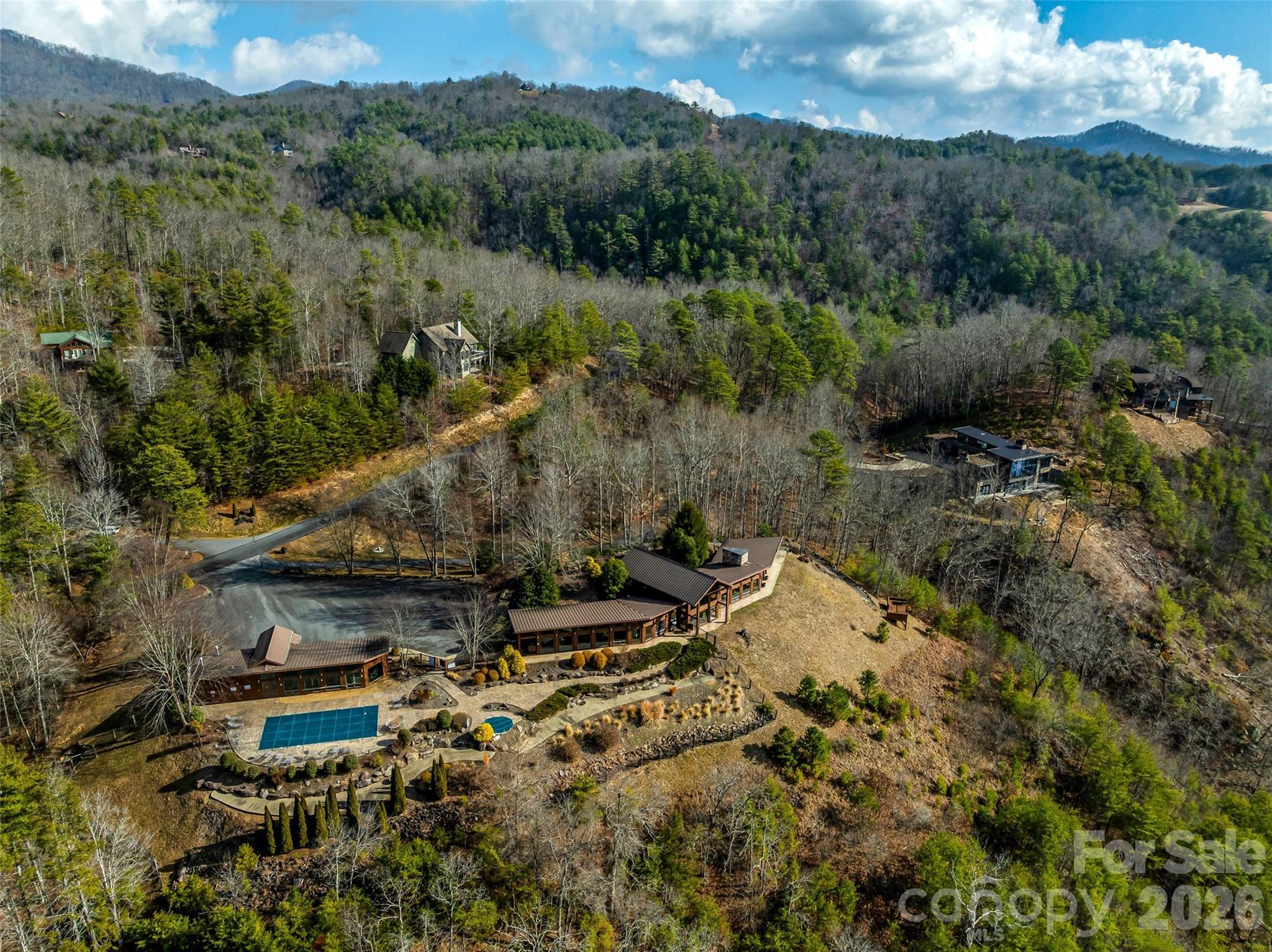 75 Wild Turkey Loop, Unit 31 Marshall, NC 28753 - Photo 24 of 38 a view of a lake with a mountain
