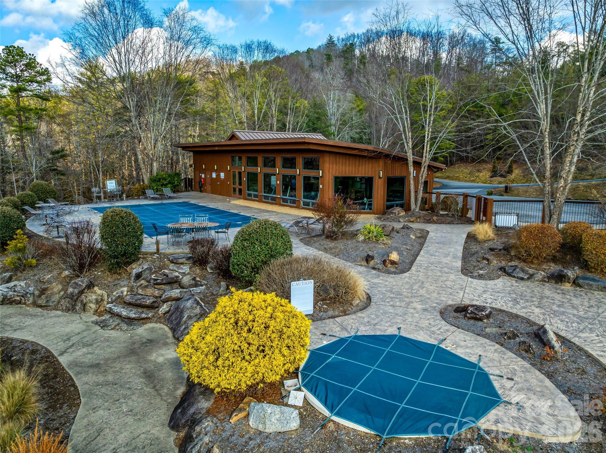 75 Wild Turkey Loop, Unit 31 Marshall, NC 28753 - Photo 25 of 38 a view of an house with backyard space and balcony
