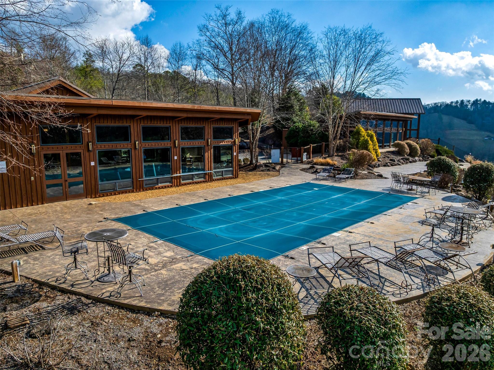 75 Wild Turkey Loop, Unit 31 Marshall, NC 28753 - Photo 26 of 38 a view of a house with swimming pool and furniture