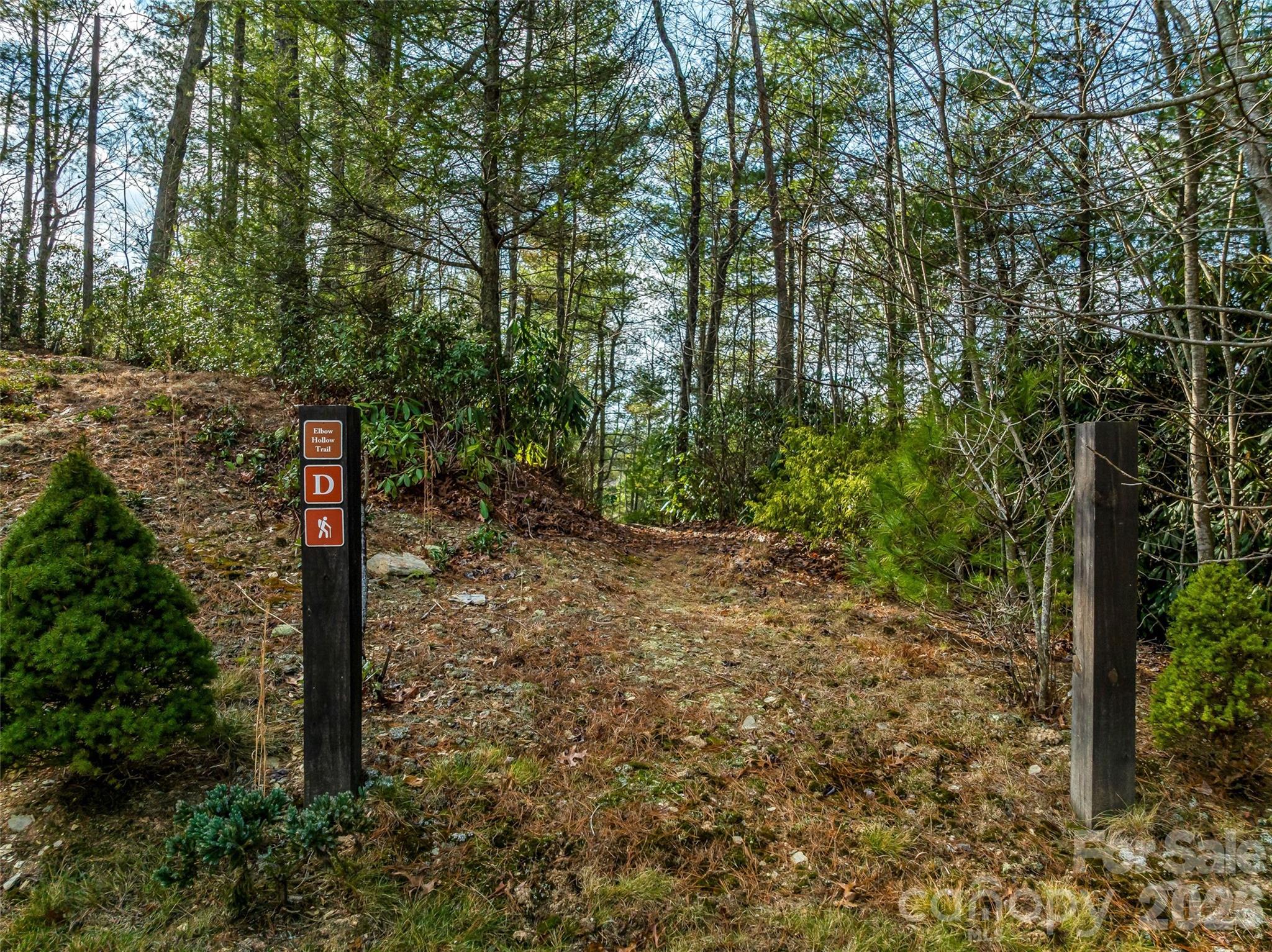 75 Wild Turkey Loop, Unit 31 Marshall, NC 28753 - Photo 36 of 38 a street sign on a road