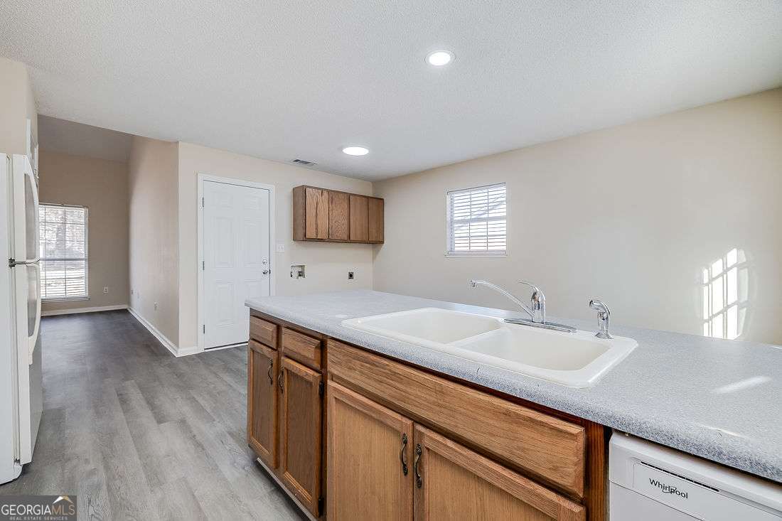 145 John Glenn Drive Rincon, GA 31326 - Photo 11 of 29 a spacious bathroom with a sink and a mirror