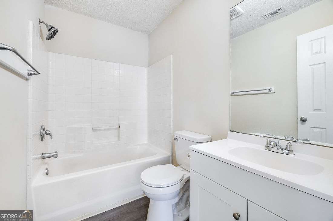 145 John Glenn Drive Rincon, GA 31326 - Photo 23 of 29 a bathroom with a sink toilet and bathtub