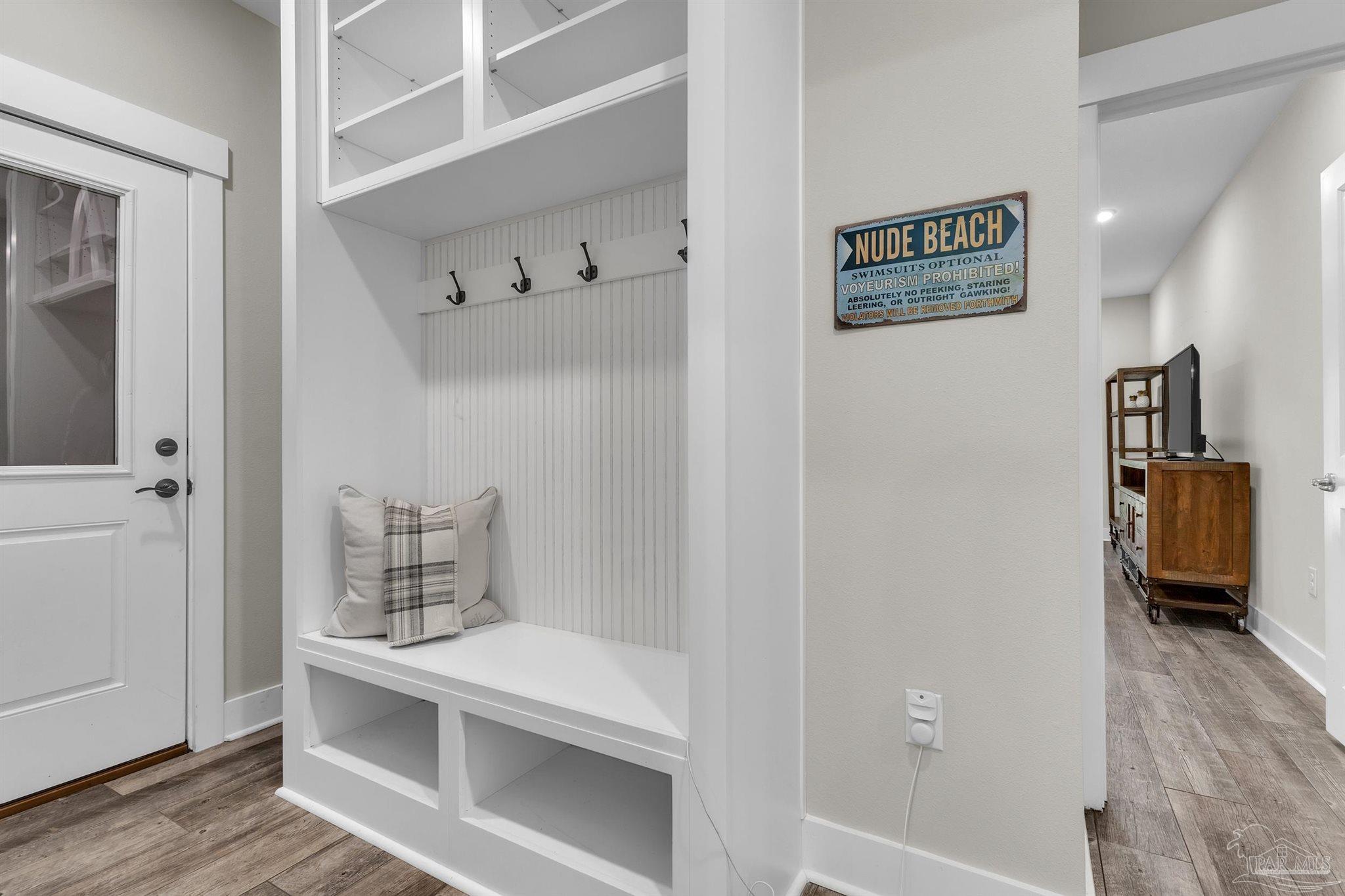 107 Countri Lane Cantonment, FL 32533 - Photo 14 of 35 a room with a bed and wooden floor