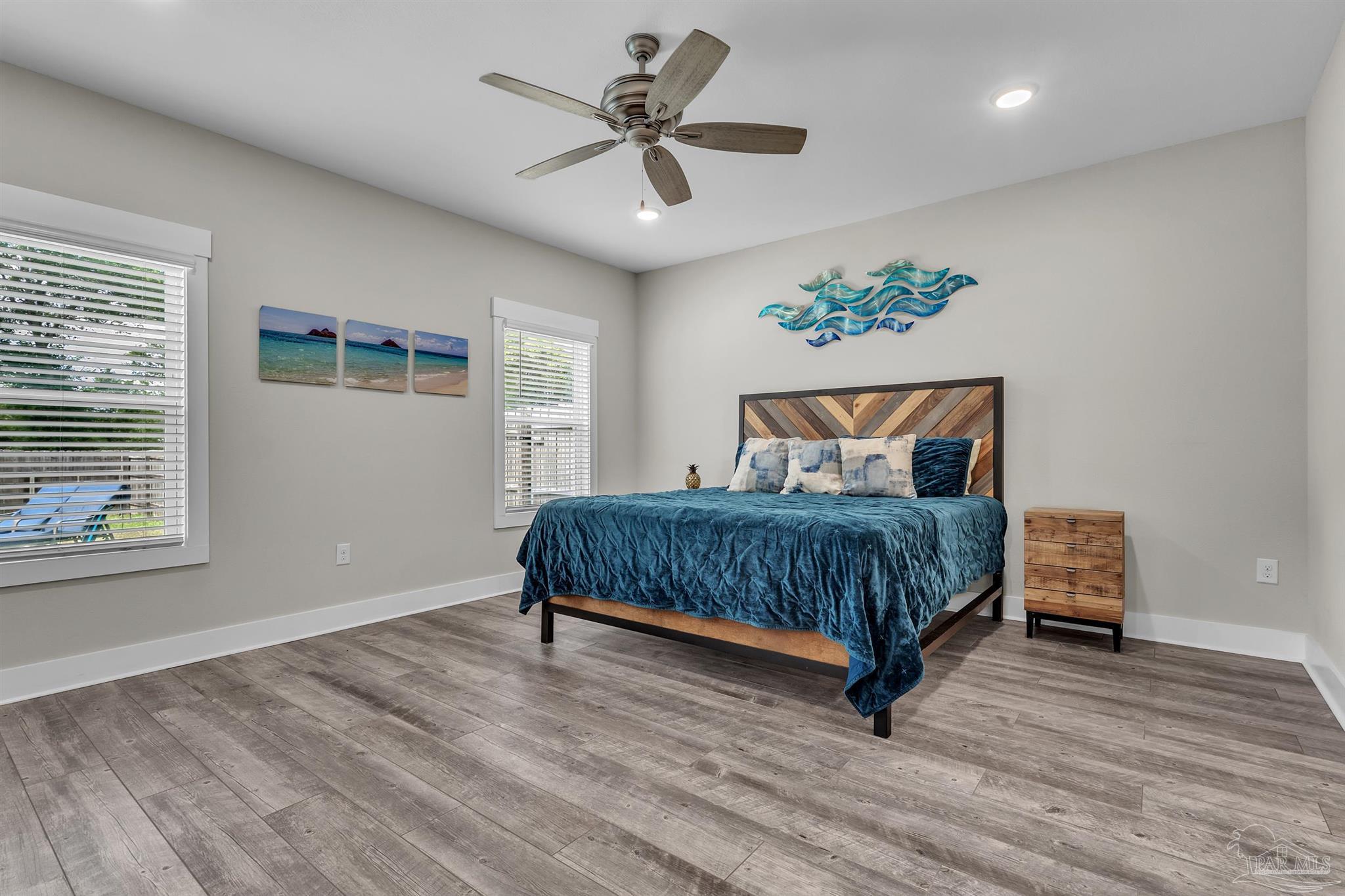 107 Countri Lane Cantonment, FL 32533 - Photo 19 of 35 a bedroom with a bed and a window