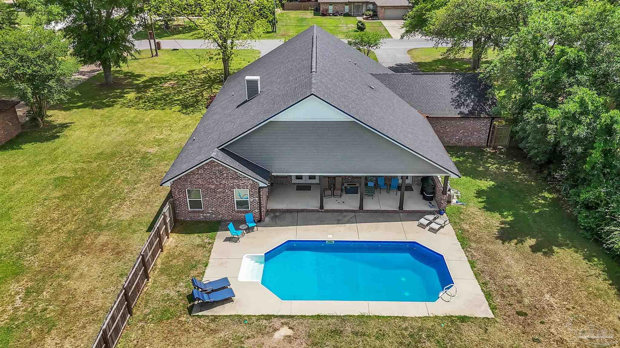 107 Countri Lane Cantonment, FL 32533 - Photo 28 of 35 a view of house with swimming pool