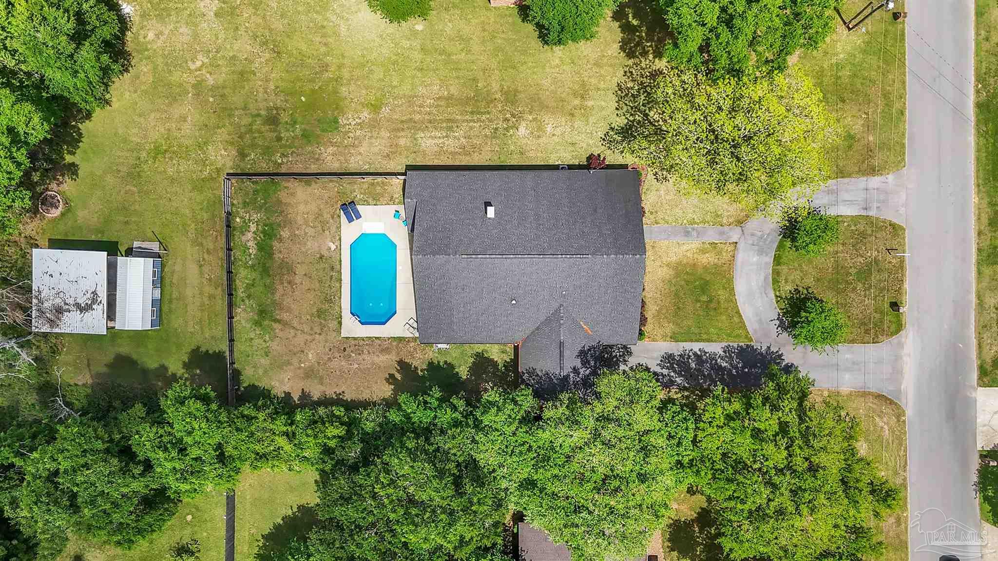 107 Countri Lane Cantonment, FL 32533 - Photo 31 of 35 an aerial view of a house with a yard