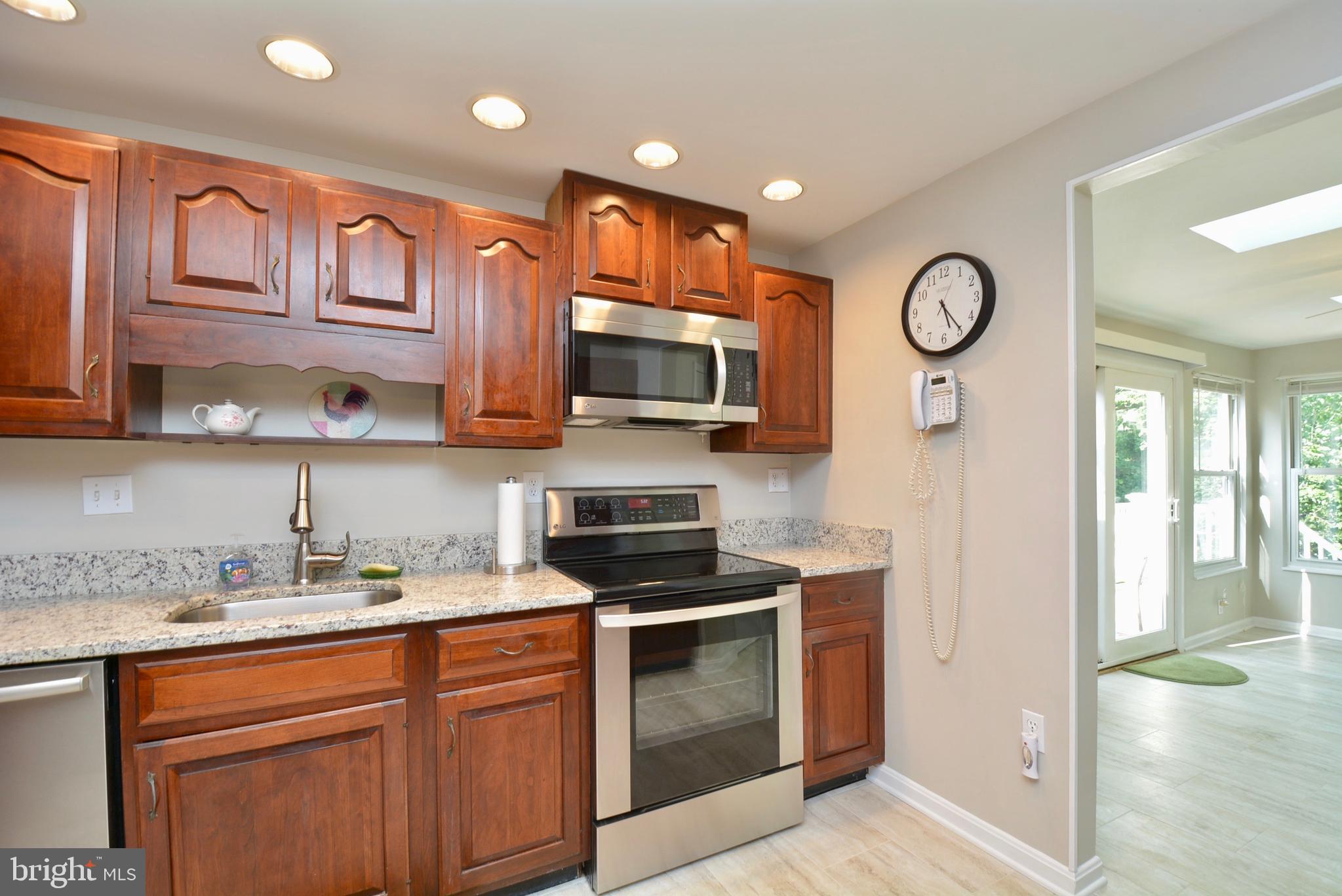 7905 Frye Road Alexandria, VA 22309 - Photo 16 of 55 VIEW FROM KITCHEN INTO SUNROOM