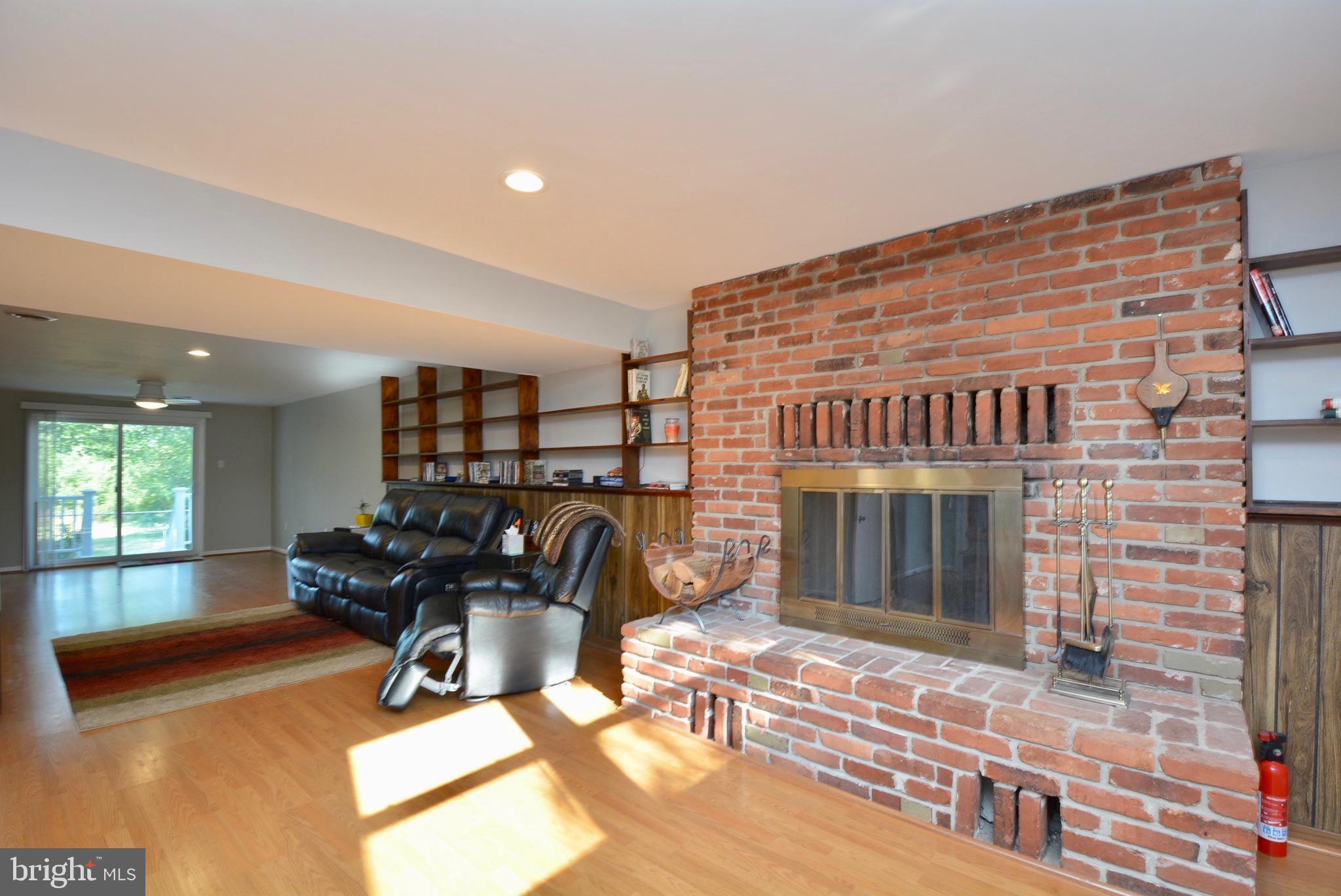 7905 Frye Road Alexandria, VA 22309 - Photo 31 of 55 LARGE FAMILY ROOM ON LOWER LEVEL WITH FIREPLACE