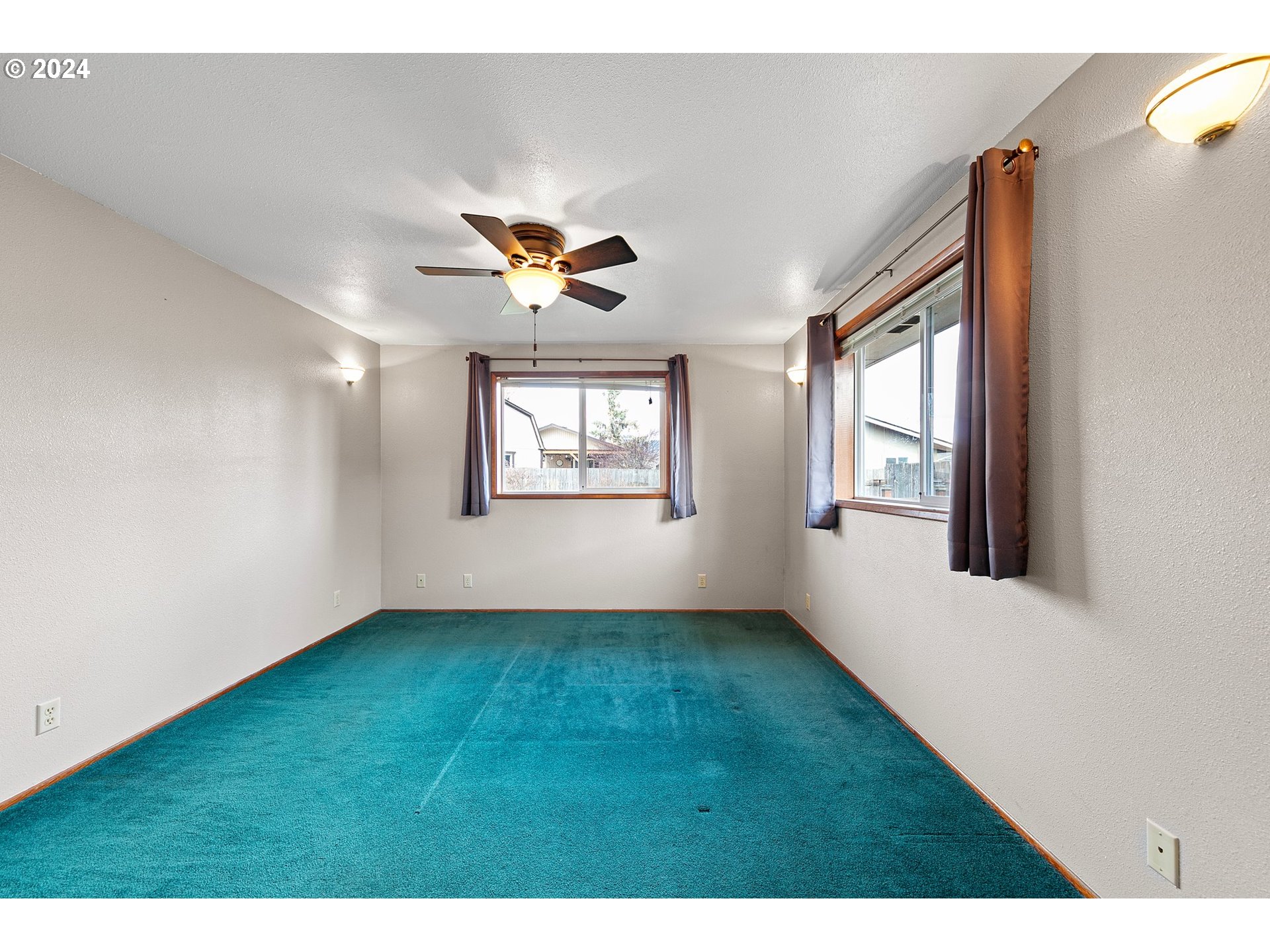 1073 56th Place Springfield, OR 97478 - Photo 11 of 27 a view of an empty room with a window