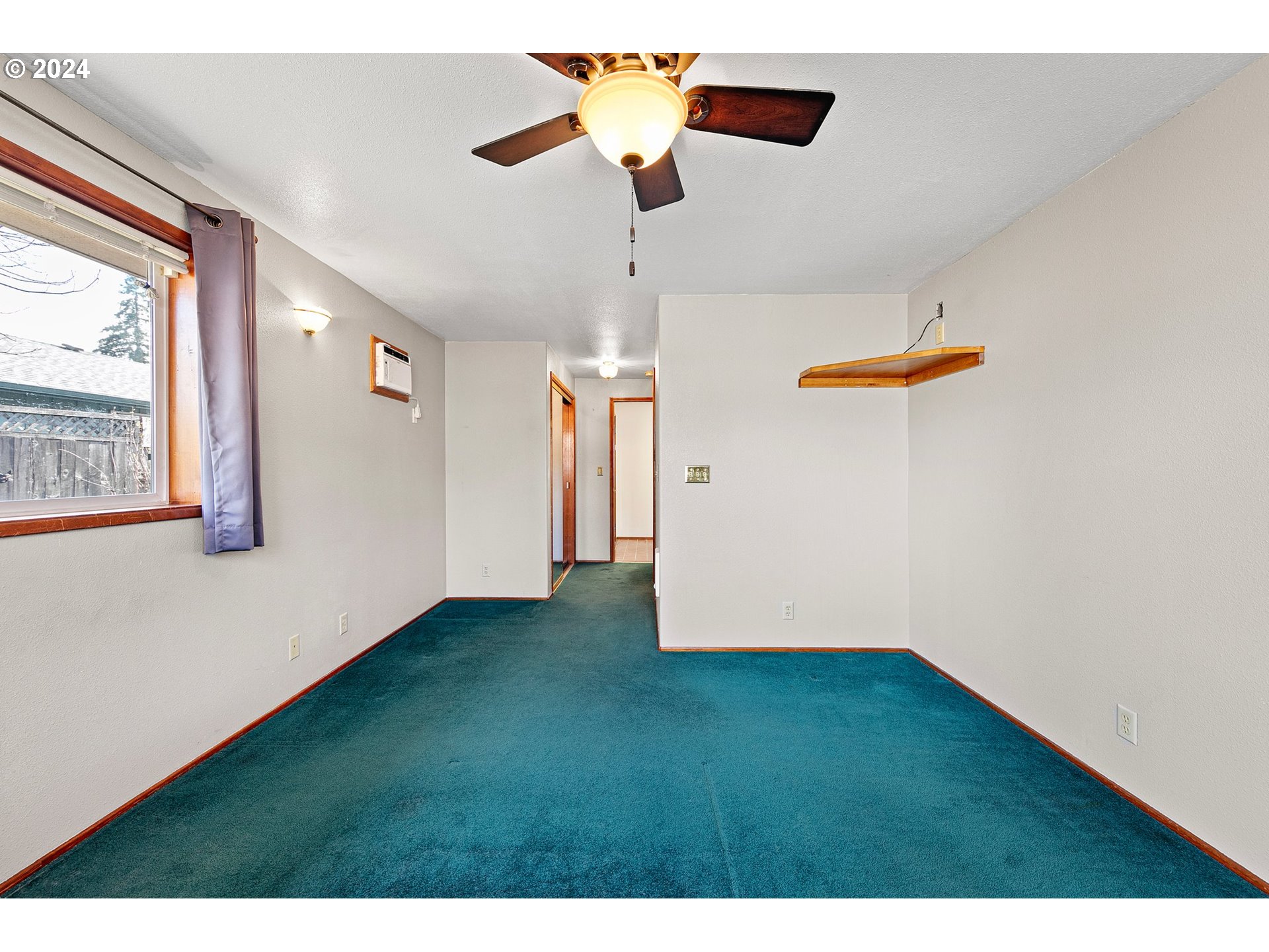 1073 56th Place Springfield, OR 97478 - Photo 12 of 27 a view of an empty room with a window