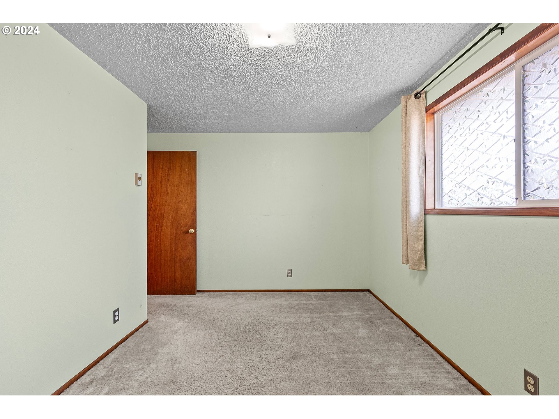 1073 56th Place Springfield, OR 97478 - Photo 19 of 27 a view of an empty room and window