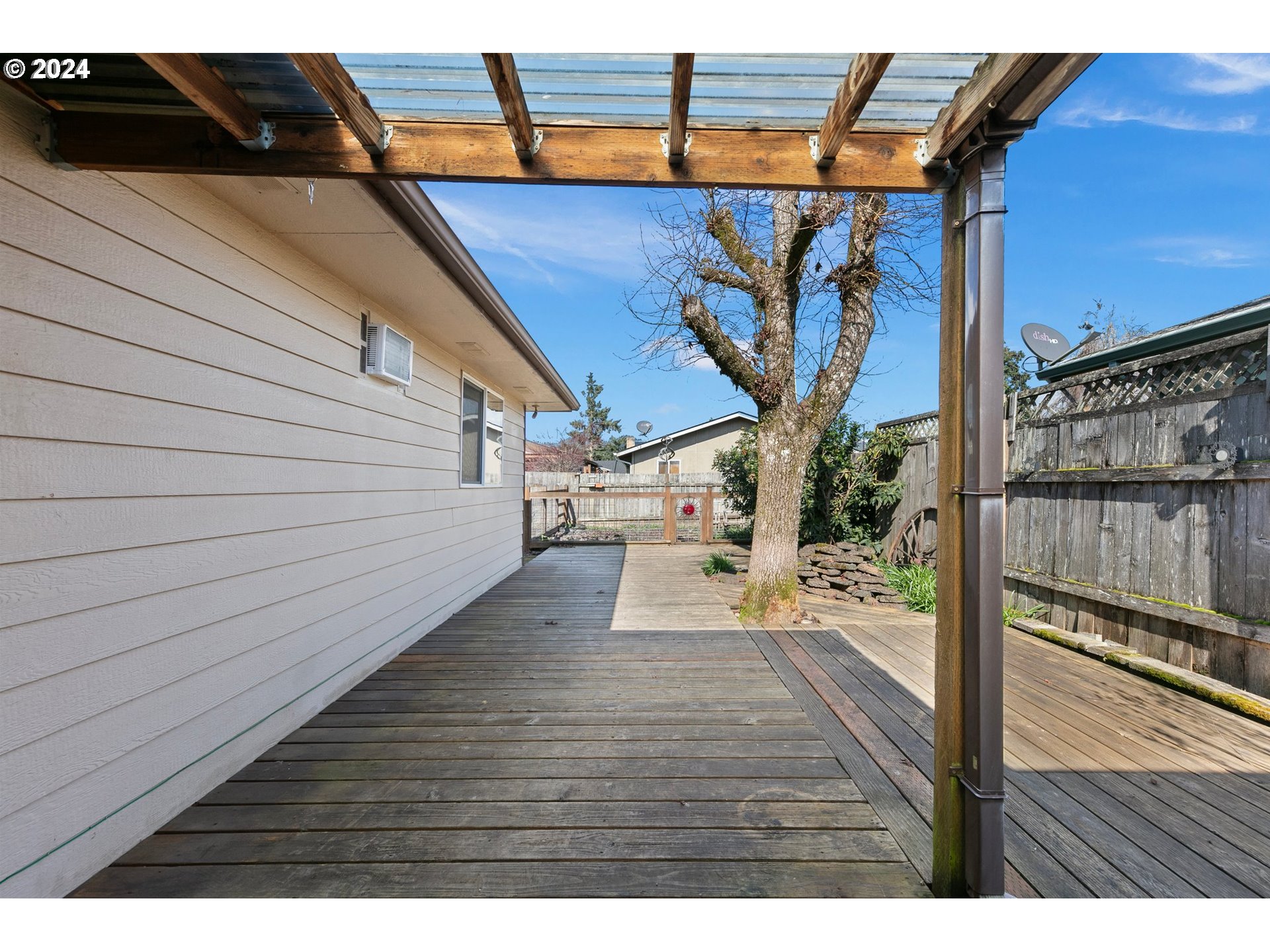 1073 56th Place Springfield, OR 97478 - Photo 24 of 27 a view of a patio with wooden floor