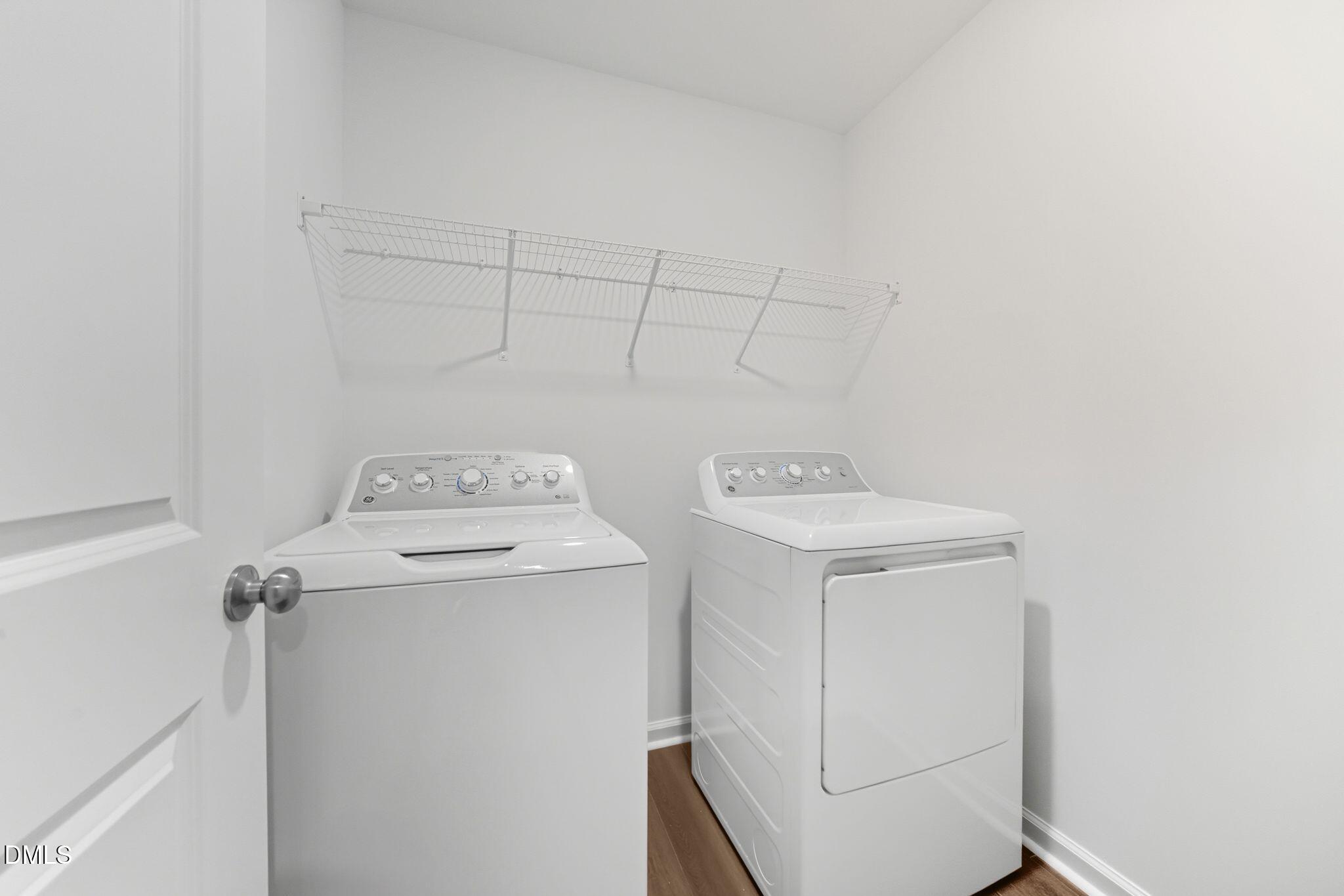 125 Tree Moss Court Rolesville, NC 27571 - Photo 20 of 30 a utility room with dryer and washer