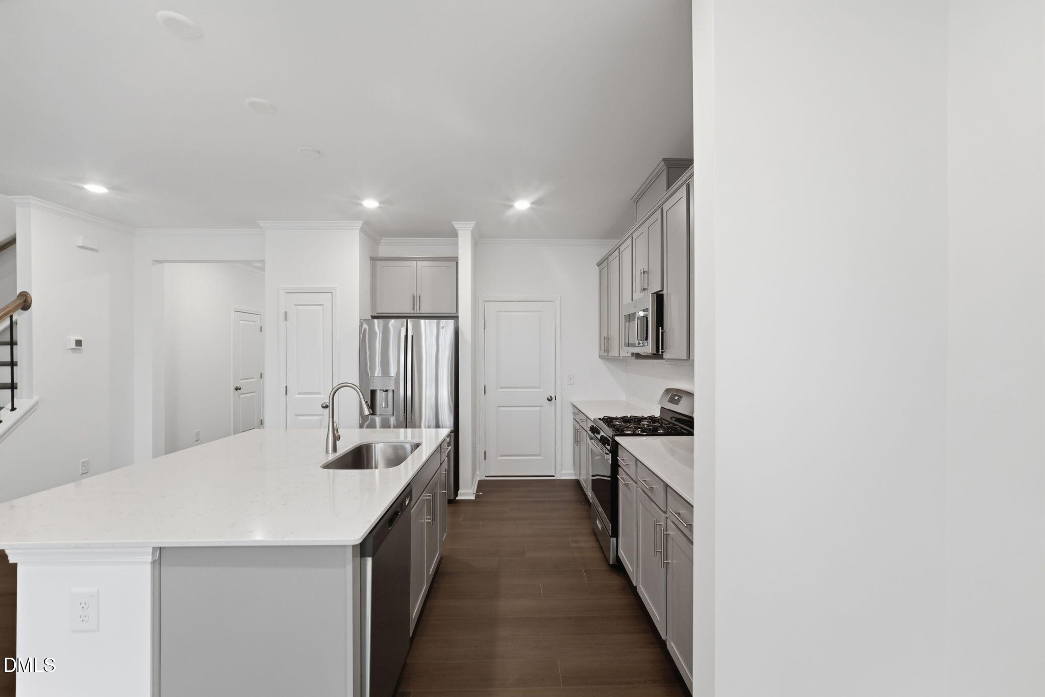 125 Tree Moss Court Rolesville, NC 27571 - Photo 7 of 30 SUN_ParkerRidge_Pic_CarsonII_QMI_29_Kitc