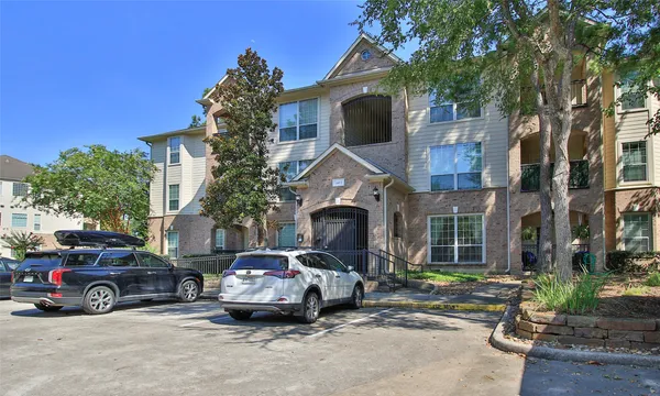 a car parked in front of a house
