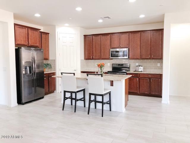 21230 West Almeria Road Buckeye, AZ 85396 - Photo 2 of 24 IMG_5527
