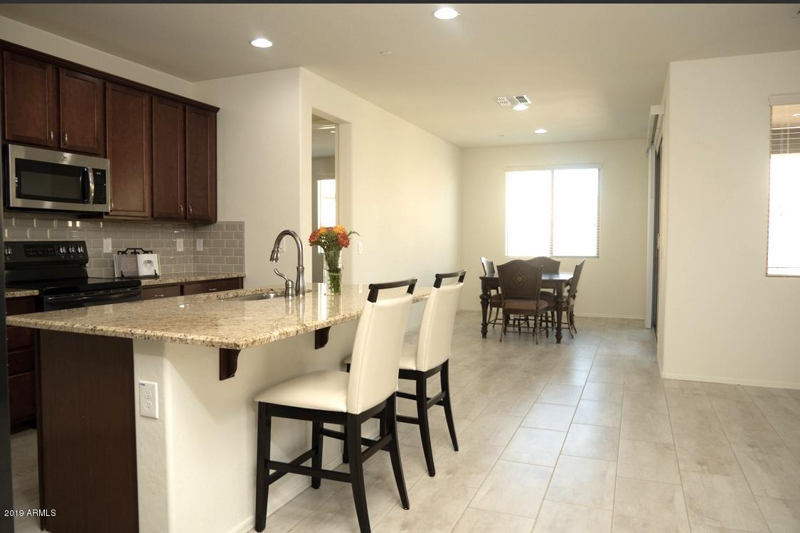 21230 West Almeria Road Buckeye, AZ 85396 - Photo 5 of 24 IMG_5520