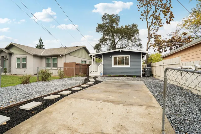 an aerial view of a house with a garden