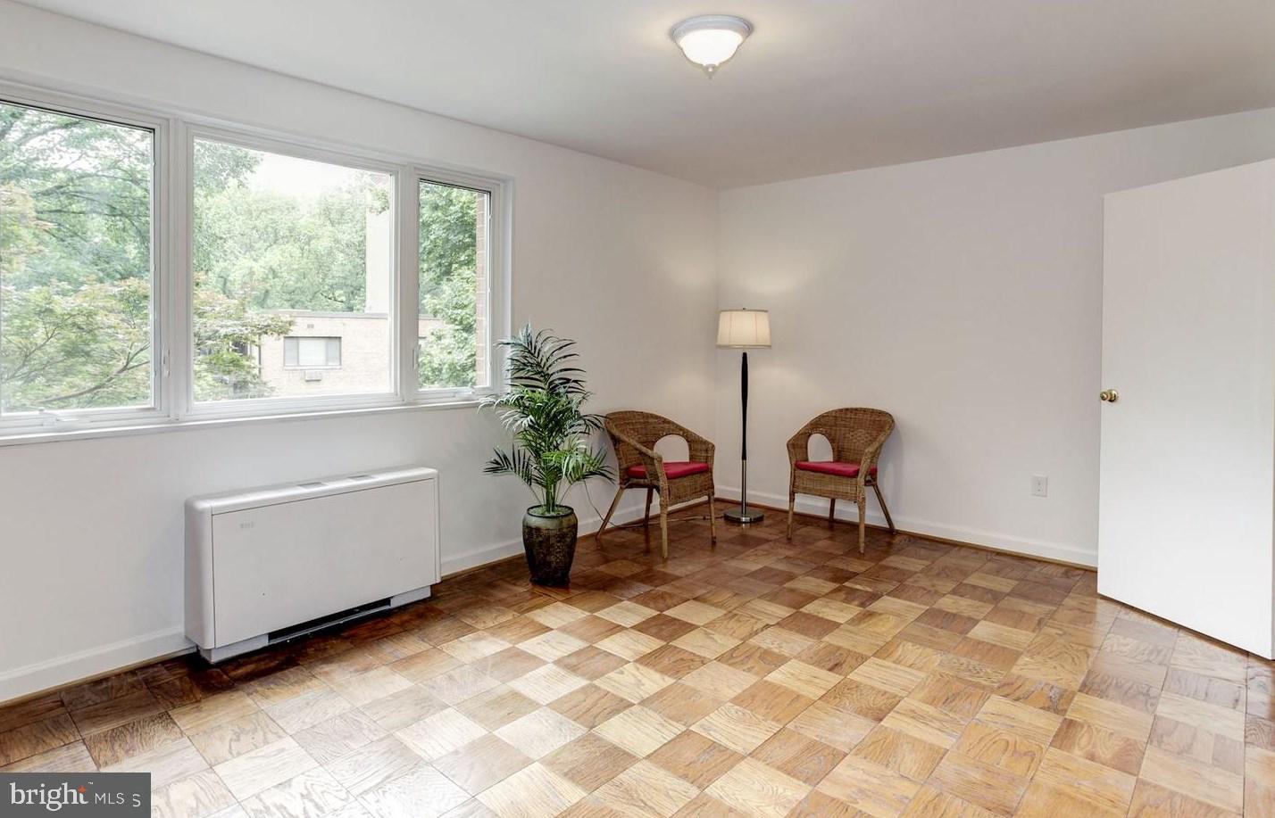 2400 41st Street Northwest, Unit 203 Washington, DC 20007 - Photo 18 of 24 a very nice looking room with a large window