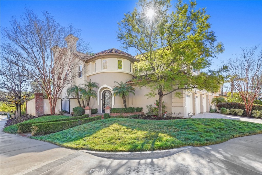 996 Blackbourne Point Oak Park, CA 91377 - Photo 2 of 75 a front view of a house with garden
