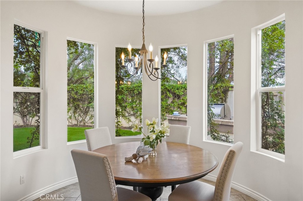 996 Blackbourne Point Oak Park, CA 91377 - Photo 27 of 75 a view of a dining room with furniture window and outside view