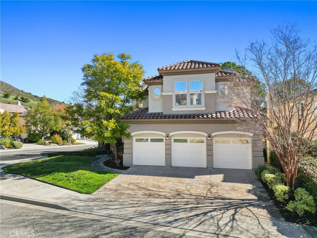 996 Blackbourne Point Oak Park, CA 91377 - Photo 3 of 75 a view of a house with a yard and potted plants