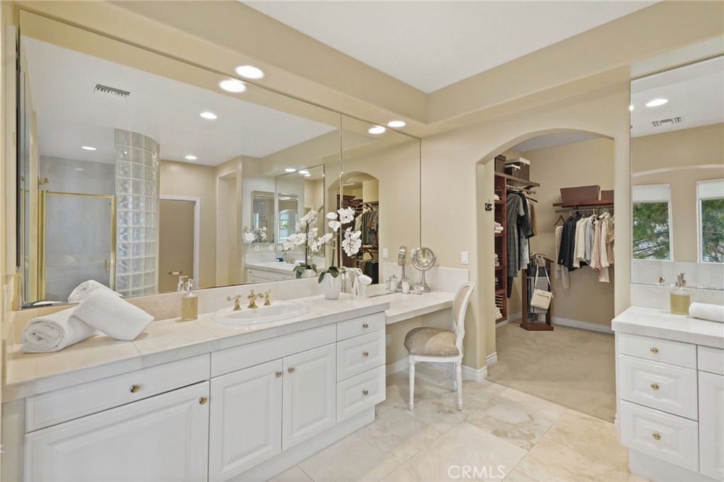996 Blackbourne Point Oak Park, CA 91377 - Photo 41 of 75 a bathroom with a double vanity sink mirror and double