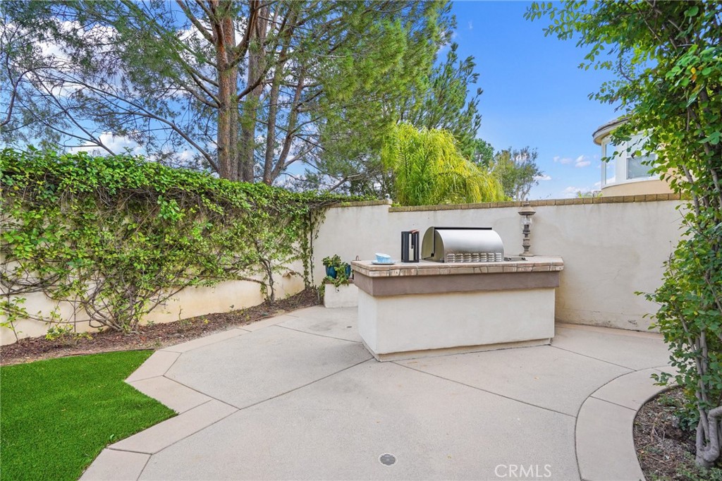 996 Blackbourne Point Oak Park, CA 91377 - Photo 61 of 75 a white house with tree in front of it