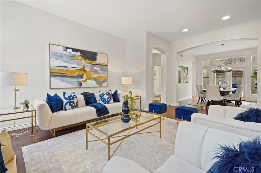 996 Blackbourne Point Oak Park, CA 91377 - Photo 10 of 75 a living room with furniture and a large window