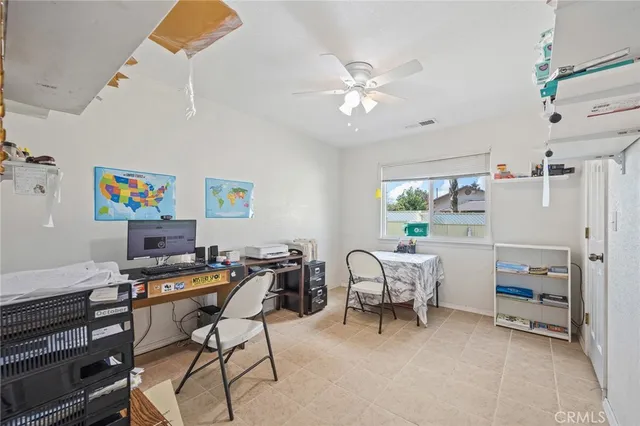 a workspace with furniture and window