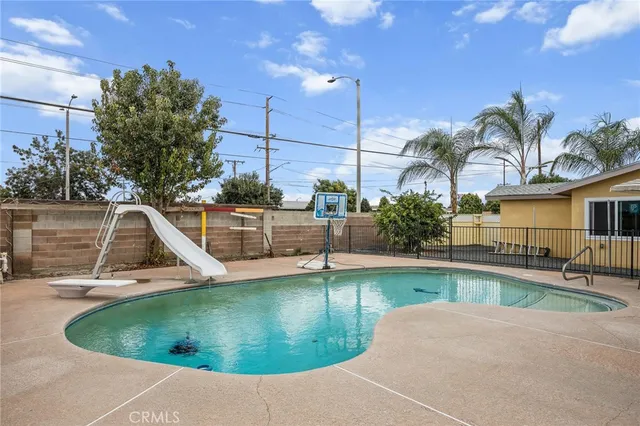 a view of a swimming pool with a slide