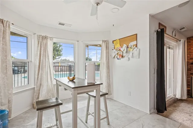 a workspace with furniture and windows