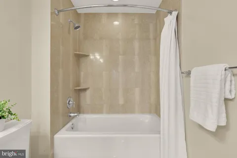 a view of a storage room with a stove top oven