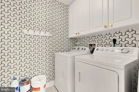 a bathroom with a sink a mirror and vanity