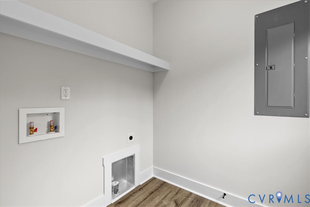 431 Raleigh Avenue South Hill, VA 23970 - Photo 14 of 27 a view of a hallway with wooden floor