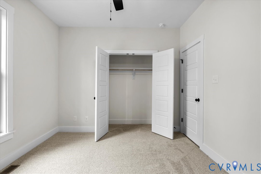 431 Raleigh Avenue South Hill, VA 23970 - Photo 23 of 27 an empty room with a empty space and window