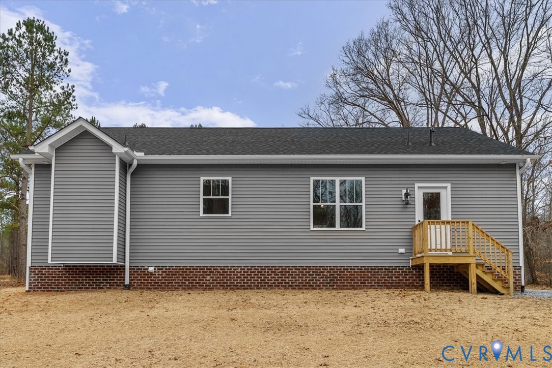 431 Raleigh Avenue South Hill, VA 23970 - Photo 6 of 27 a backyard of a house with yard and barbeque oven