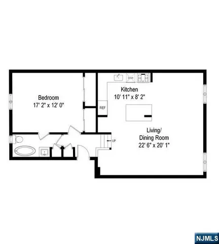 a car parked in front of a brick building