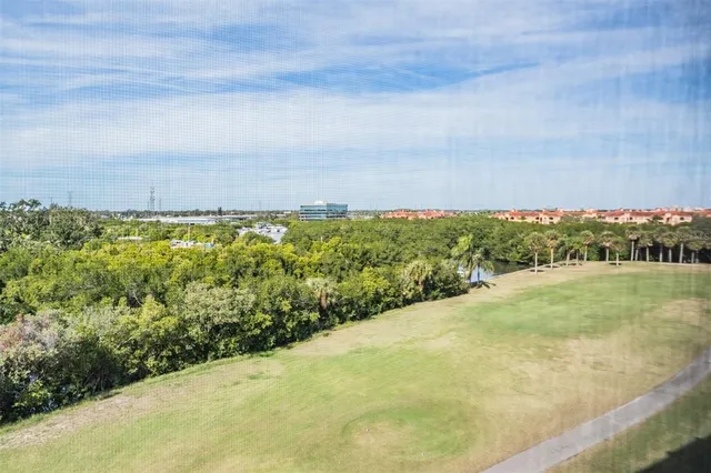a view of a yard and ocean