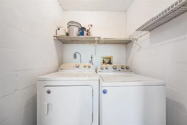 a utility room with dryer and washer