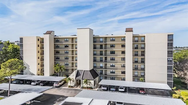 a front view of a building with glass windows