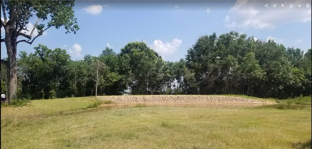 a swimming pool with an outdoor space