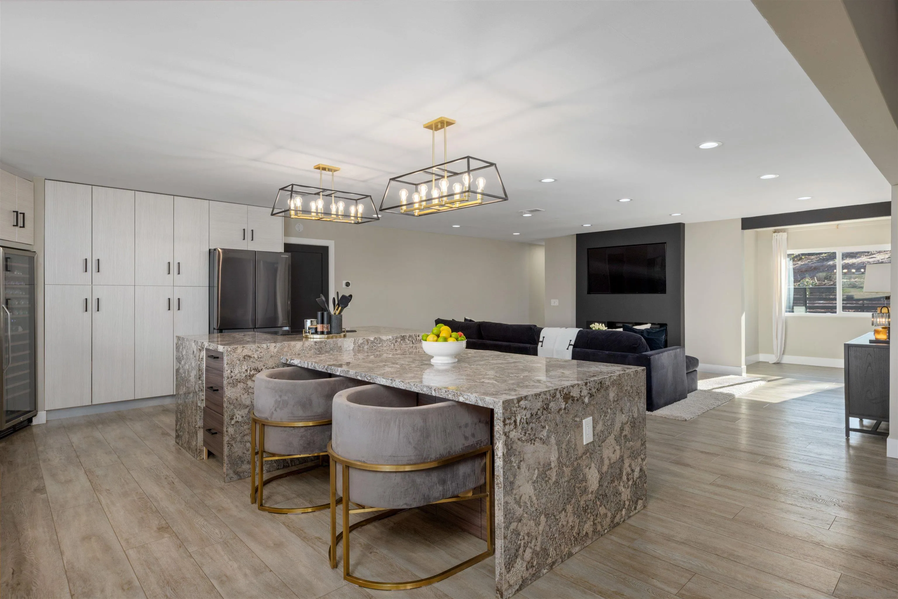 521 Rancho Camino Fallbrook, CA 92028 - Photo 16 of 72 a work room with furniture a flat screen tv and a chandelier