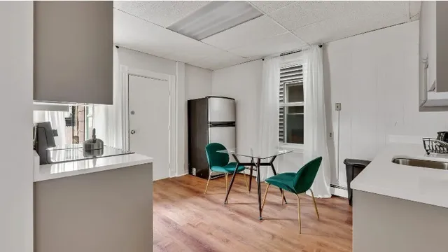 a workspace with furniture and wooden floor