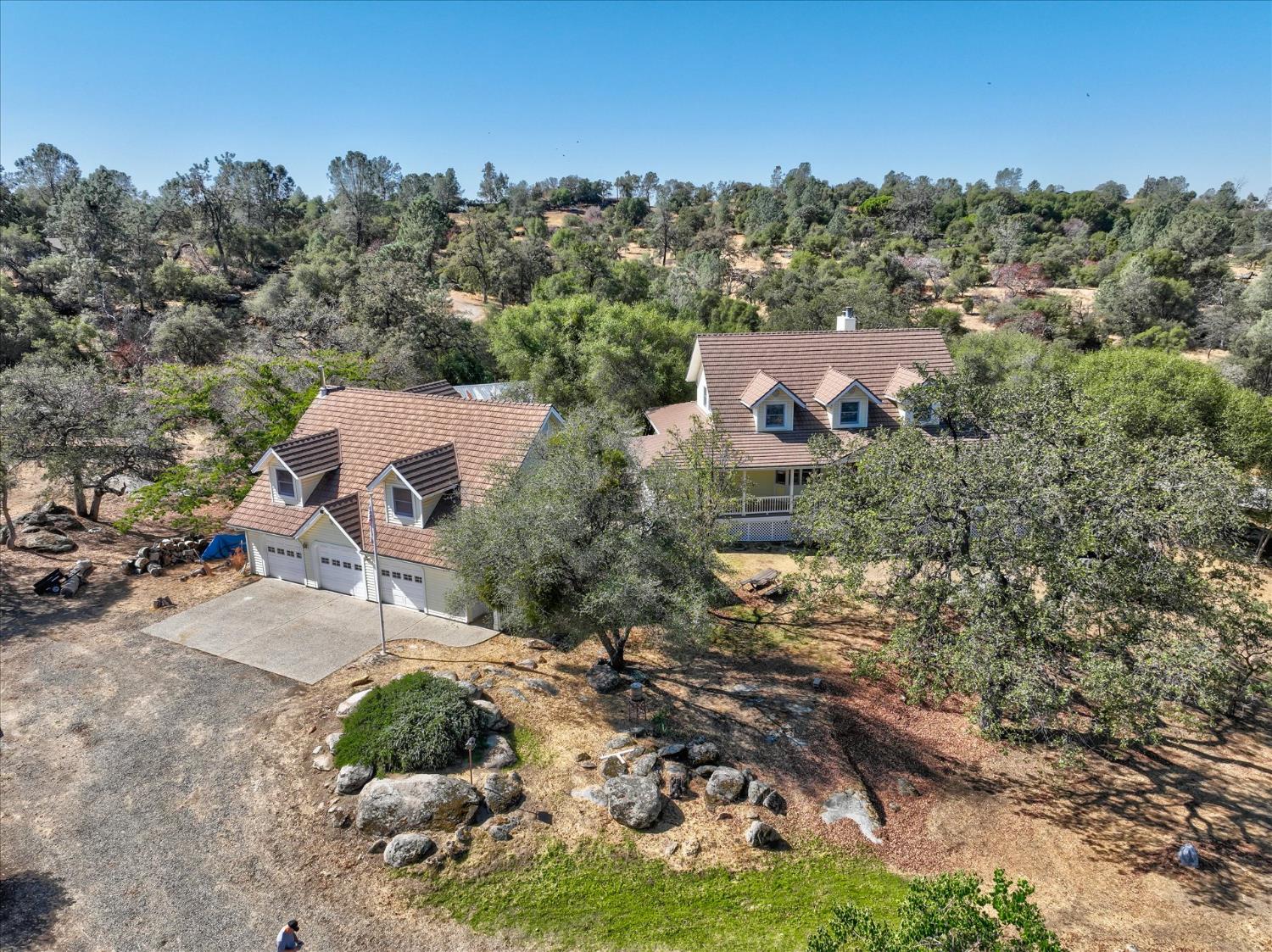 a aerial view of a house with a garden
