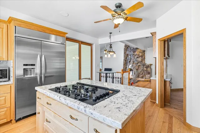 a bathroom with a shower and toilet