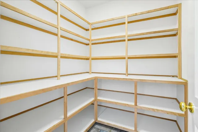 a bathroom with a sink a vanity and a mirror